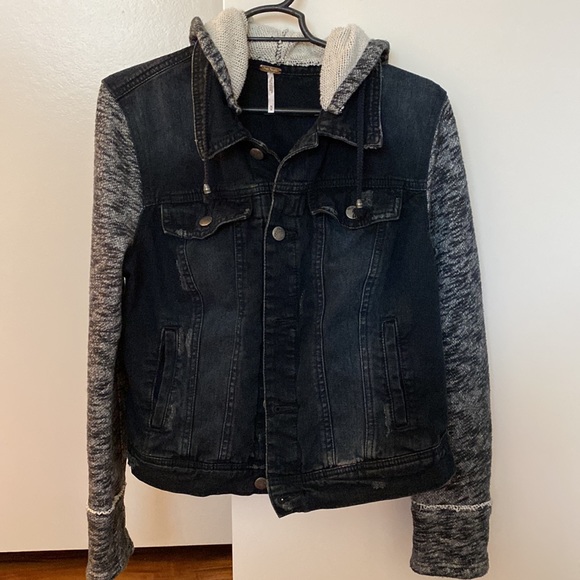 Free People distressed denim jacket with knit sleeves